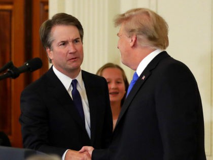 President Donald Trump shakes hands with Judge Brett Kavanaugh his Supreme Court nominee, in the East Room of the White House, Monday, July 9, 2018, in Washington. (AP Photo/Evan Vucci)