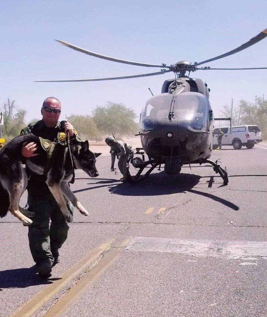 A National Guard aircrew rescues a Border Patrol K-9 suffering from heat exhaustion in the Arizona desert. (Photo: U.S. Border Patrol)