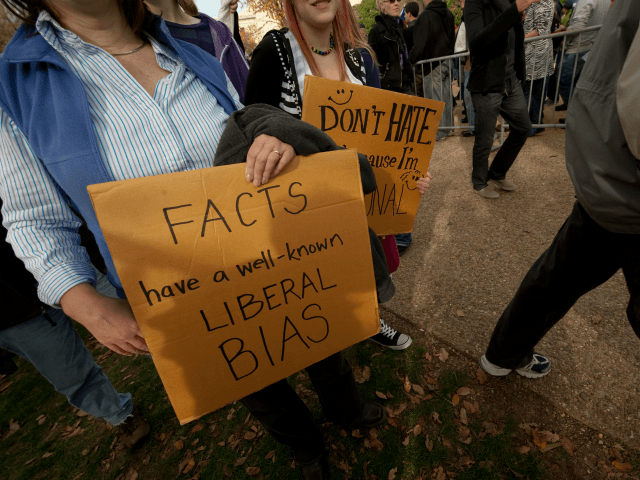 People gather on the National Mall in Washington, DC, on October 30, 2010 for television s