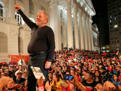 Brazil's former President Luiz Inacio Lula da Silva amid supporters during the final rally of his week-long campaign tour of southern Brazil, in Curitiba, Parana state, March 28, 2018. AP Photo/Eraldo Peres