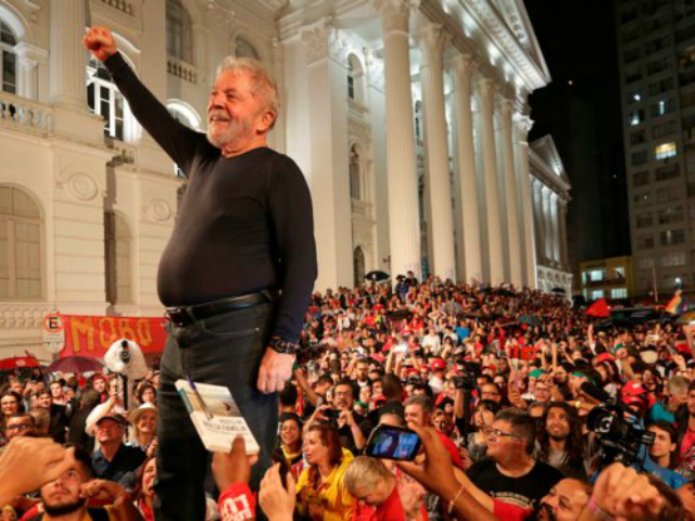 Brazil's former President Luiz Inacio Lula da Silva amid supporters during the final rally