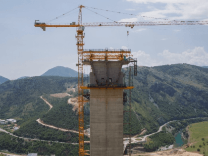 PODGORICA (Reuters) - Perched atop massive cement pillars that tower above Montenegro’s picturesque Moraca river canyon, scores of Chinese workers are building a state-of-the-art highway through some of the roughest terrain in southern Europe.