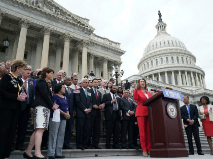 WASHINGTON, DC - JUNE 20: U.S. House Minority Leader Rep. Nancy Pelosi (D-CA) speaks as other House Democrats listen during a news conference in front of the U.S. Capitol June 20, 2108 in Washington, DC. House Democrats held a news conference to discuss H.R.6135, 'The Keep Families Together Act.' (Photo …