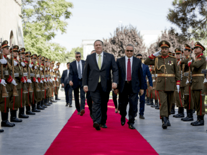 Secretary of State Mike Pompeo, center is greeted by Chief of Staff Abdul Salam Rahimi, center right, as he arrives at Gul Khanna in the Presidential Palace in Kabul, Afghanistan, Monday, July 9, 2018. Pompeo is on a trip traveling to North Korea, Japan, Vietnam, Afghanistan, Abu Dhabi, and Brussels. …