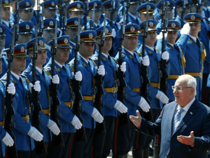 Israeli President Reuven Rivlin reviews the honour guard upon his arrival at the Serbia Pa