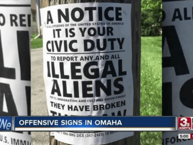 Signs urge reporting of 'illegal aliens' to ICE