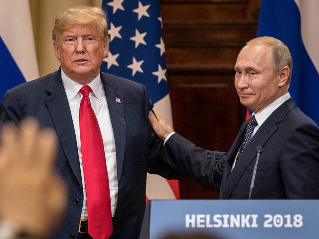 HELSINKI, FINLAND - JULY 16: U.S. President Donald Trump (L) and Russian President Vladimir Putin shake hands during a joint press conference after their summit on July 16, 2018 in Helsinki, Finland. The two leaders met one-on-one and discussed a range of issues including the 2016 U.S Election collusion. (Photo …