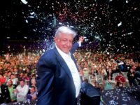 Mexico's president-elect Andres Manuel Lopez Obrador (C) cheers his supporters at the Zocalo Square in Mexico City after winning general elections Mexico's president-elect Andres Manuel Lopez Obrador (C) cheers his supporters at the Zocalo Square in Mexico City after winning general elections