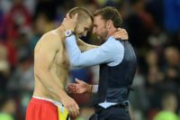Gareth Southgate celebrates with Eric Dier after England beat Colombia on penalties to reach the World Cup quarter-finals