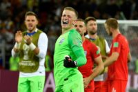 Standing tall: Jordan Pickford's penalty save helped England reach the World Cup quarter-finals