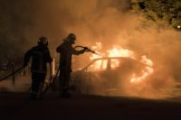 Cars were burned and a shopping centre partly set alight in the Breil neighbourhood of France's Nantes as police confronted young people, some armed with molotov cocktails
