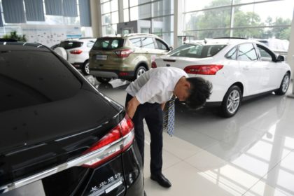 Global stocks mostly rise even as US-China trade war gets real