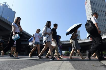 Asian stocks climb despite first trade war shots