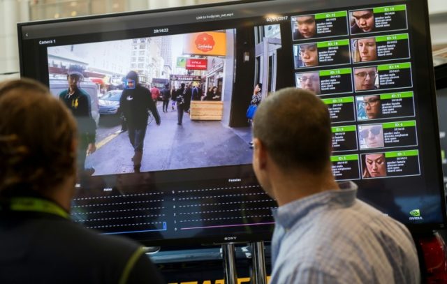 A display shows a facial recognition system for law enforcement during the NVIDIA GPU Technology Conference in 2017 in Washington As facial recognition use grows, so do privacy fears
