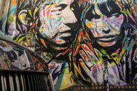 A mural of French Serge Gainsbourg and British-French Jane Birkin by artist Jo Di Bona in Paris