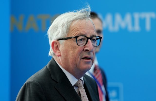 Back pain, not alcohol, caused Juncker summit stumble: EU