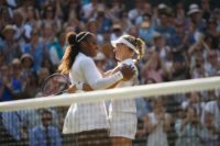 Champion: Angelique Kerber embraces Serena Williams