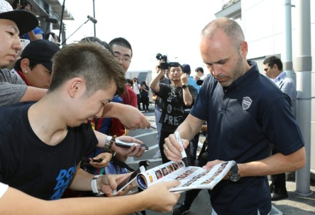 Fans cheer as Iniesta lands in Japan to join Vissel Kobe