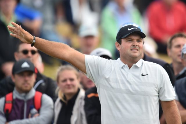 Masters champion Reed leads early charge at British Open