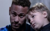 Neymar, with his son Davi Lucca, in an interview with AFP on July 21, 2018