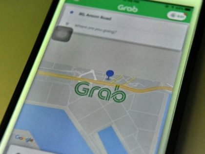 Ride-hailing firm Grab hits back in Uber takeover row