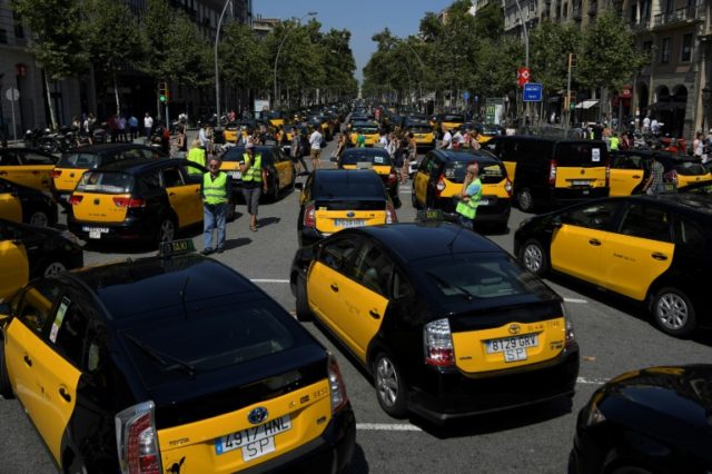 Madrid taxis join Barcelona strike against Uber