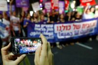 Protesters in Tel Aviv rally against the controversial legislation on July 14, 2018, before the bill was passed by lawmakers