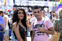 Syrian refugees, transgender Katia al-Shehaby and her twin brother Nour at the Christopher Street Day parade in Berlin