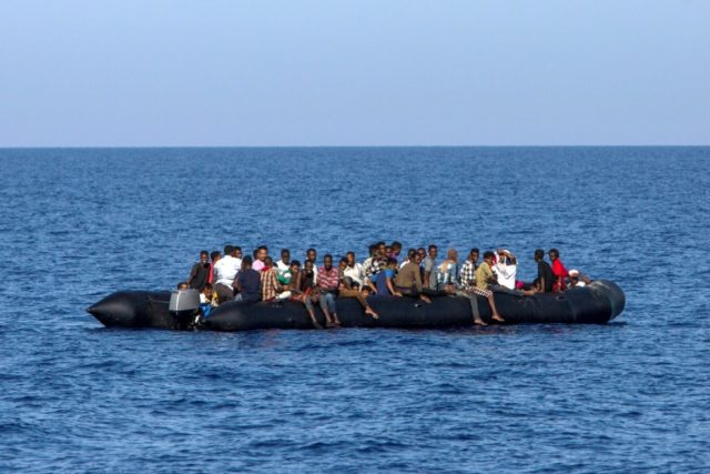 Italian boat accused of breaking law by taking migrants to Libya