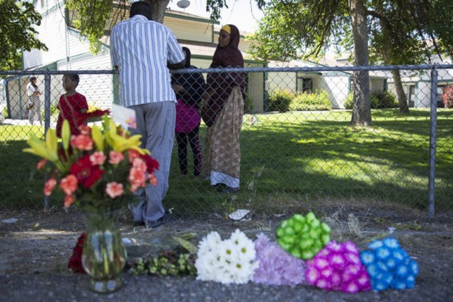 Mass Stabbing Idaho Ibod Hasn, center, talks to a friend who came to visit after Saturday's stabbing attack in Boise, Idaho, Sunday, July 1, 2018. A man who had been asked to leave an Idaho apartment complex because of bad behavior returned the next day and stabbed people, including several children, at a toddler's birthday party, police said. (Meiying Wu/Idaho Statesman via AP) The Associated Press