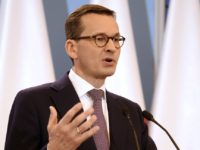 Poland Holocaust Law Mateusz Morawiecki Polish Prime Minister Mateusz Morawiecki presents the Joint Declaration of Prime Ministers of the State of Israel and the Republic of Poland, in his chancellery in Warsaw, Poland, Wednesday, June 27, 2018. Poland’s President Andrzej Duda has signed into law amendments which abolish the threat of prison for anyone who blames Poland for Nazi Germany’s Holocaust crimes. The amendments were introduced Wednesday morning by the prime minister and quickly approved by lawmakers. (AP Photo/Alik Keplicz) Mateusz Morawiecki