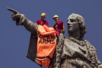The Latest: Columbus statue protest over migrant deaths
