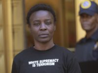 APTOPIX Statue of Liberty Arrrest Therese Patricia Okoumou Therese Okoumou leaves Federal court, Thursday, July 5, 2018, in New York. Okoumou, who climbed the base of the Statue of Liberty on a busy Fourth of July in what prosecutors called a "dangerous stunt" pleaded not guilty Thursday to misdemeanor trespassing and disorderly conduct . A federal judge released Okoumou without bail after her court appearance. (AP Photo/Mary Altaffer) Therese Patricia Okoumou