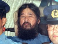 Japan Doomsday Cult Execution Shoko Asahara In this Sept. 25, 1995, file photo, Japanese doomsday cult leader Shoko Asahara, center, sits in a police van following an interrogation in Tokyo. Japanese media reports say on Friday, July 6, 2018, Asahara, who has been on death row for masterminding the 1995 deadly Tokyo subway gassing and other crimes, has been executed. He was 63. (Kyodo News via AP, File) Shoko Asahara