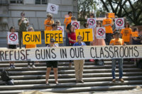 Campus Carry Texas In this Oct. 1, 2015, file photo, protesters gather on the West Mall of the University of Texas campus, in Austin, to oppose a new state law that expands the rights of concealed handgun license holders to carry their weapons on public college campuses and as of Aug. 1, 2016, they can carry in campus buildings. Attorneys for three University of Texas professors were set to ask a federal appeals court Wednesday, July 11, 2018, to revive their lawsuit against the law allowing people with concealed handgun licenses to carry weapons on public campuses. (Ralph Barrera/Austin American Statesman via AP, File) Appeals court hears challenge to Texas campus carry law