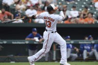 Machado homers, exits early in Orioles' 6-5 win over Texas