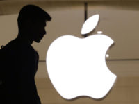 Earns Apple In this May 31, 2018, photo, a customer enters the Apple store in New York. Apple made more money from higher priced iPhones in the latest quarter, even as unit sales were relatively unchanged. Shares of Apple rose nearly 3 percent Tuesday, July 31, after it reported fiscal third quarter results that beat Wall Street expectations. (AP Photo/Mark Lennihan) Apple shares rise on pricey iPhones; no tariff impact yet