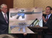 Trump 3D Guns Congress Sen. Edward Markey, D Mass., left, and Sen. Richard Blumenthal, D Ct., display a photo of a plastic gun on Tuesday, July 31, 2018, on Capitol Hill in Washington. Democrats are calling on President Donald Trump to reverse an administration decision to allow a Texas company to make blueprints for a 3D printed gun available online. (AP Photo/Matthew Daly) Judge blocks release of blueprints for 3D-printed guns