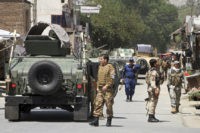 Roadside bomb, assault on compound kill 17 in Afghanistan