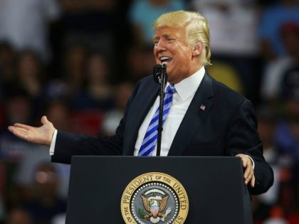 CHARLESTON, WV - AUGUST 21: President Donald Trump speaks a rally at the Charleston Civic Center on August 21, 2018 in Charleston, West Virginia. Paul Manafort, a former campaign manager for Trump and a longtime political operative, was found guilty in a Washington court today of not paying taxes on …