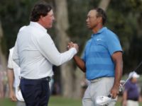 AP Lynne Sladky Woods Mickelson