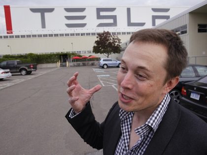 Tesla CEO Elon Musk unveils the new Tesla factory in Fremont, Calif., Wednesday, Oct. 27, 2010. The new Tesla factory is the former NUMMI plant. (AP Photo/Paul Sakuma)