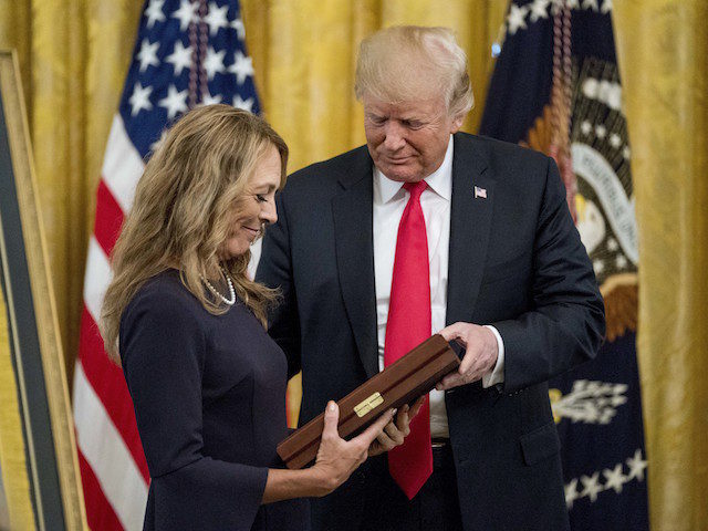 Valerie Nessel accepts the Medal of Honor from President Donald Trump for her husband Air