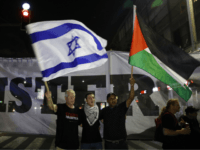 Arab Israelis rally against Jewish nation-state law Arab Israelis and their supporters carry a Palestinian (R) and an Israeli flag during a demonstration to protest against the 'Jewish Nation-State Law' in the Israeli coastal city of Tel Aviv on August 11, 2018. The banner in Arabic and Hebrew reads 'justice'. - The controversial law passed last month …