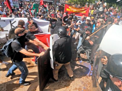 White nationalist demonstrators clash with counter demonstrators at the entrance to Lee Pa