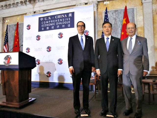 From left, Treasury Secretary Steve Mnuchin, Chinese Vice Premier Wang Yang and Commerce S