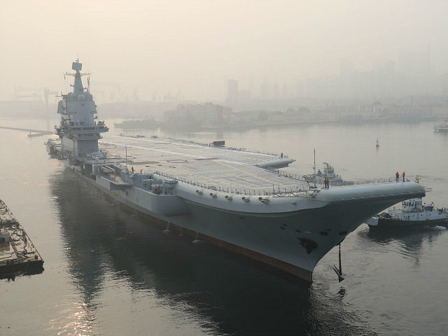 China's first domestically manufactured aircraft carrier, known only as 'Type 001A', leaves port in the northeast city of Dalian early on May 13, 2018. - China's first domestically manufactured aircraft carrier started sea trials on May 13, state media said, a landmark in Beijing's ambitious plans to modernise its navy …