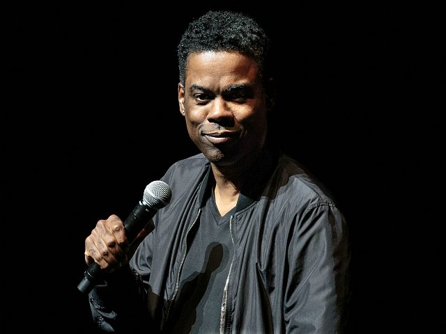 US actor/comedian Chris Rock performs onstage during the Total Blackout Tour at Bass Conce