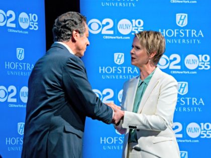 New York Gov. Andrew Cuomo, left, shakes hands with Democratic New York gubernatorial candidate Cynthia Nixon before their debate at Hofstra University in Hempstead, N.Y., Wednesday, Aug. 29, 2018.