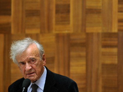 Nobel laureate and Holocaust survivor Elie Wiesel (R) delivers a speech during a conference on the sideline of a five-day UN review conference on racism at the United Nations Offices on April 21, 2009 in Geneva. Wiesel said he failed to understand why Iran's President was allowed to make 'anti-Semitic' …